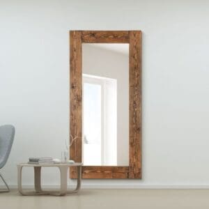 Rustic pine wood mirror. Full length design wall mounted in the living room.