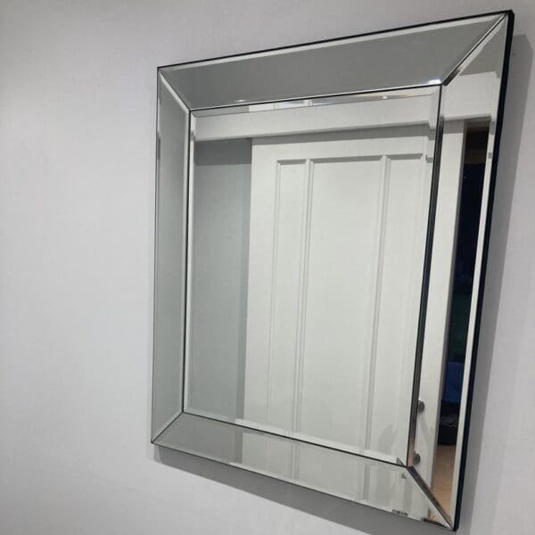 Newton bevelled glass mirror. Wall mounted rectangle mirror in the hallway.