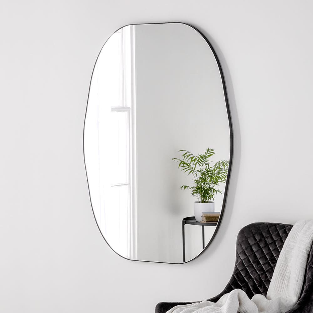 Minimalist Mirrors. Wall mounted curved funky mirror.