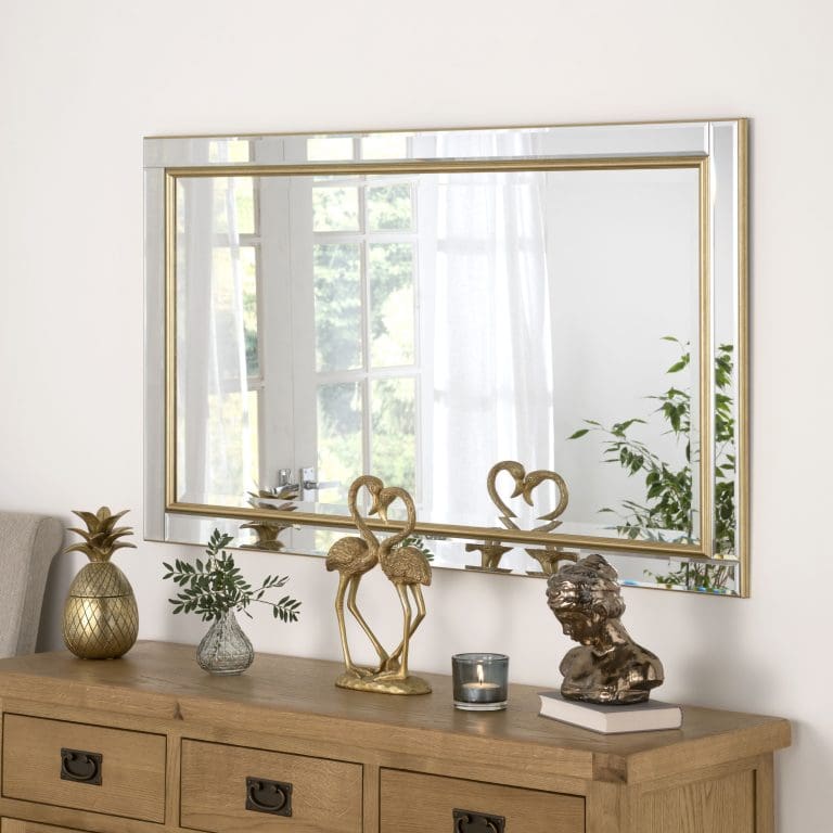 Bespoke Verona Mirror. Features a gold insert. Wall mounted above the side board in the living room. Can be bespoke made.