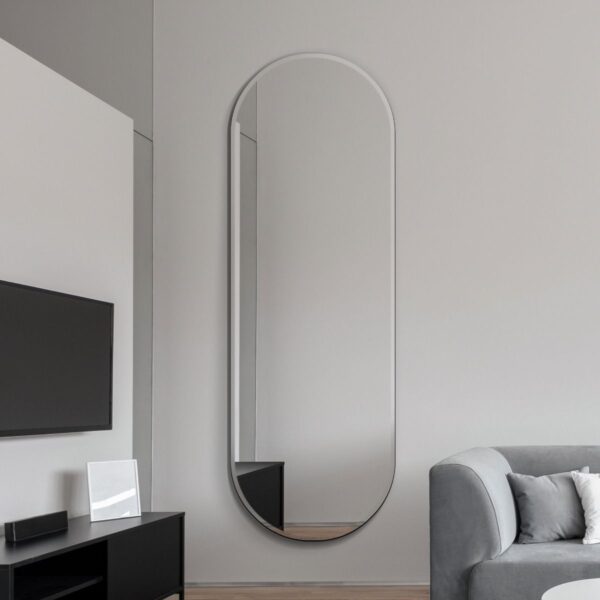 Brandon Tall Frameless Curved Mirror Wall Mounted in the Living Room