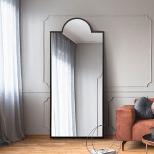 Capitol Dome Black Metal Mirror. Dome Shape Mirror Leaning against Living Room Wall.