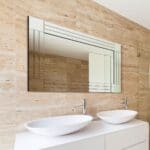 Can you hang a standard mirror in the bathroom?Yes you can, but it depends on your bathroom's ventilation and usage. Consider how humid your bathroom tends to be.